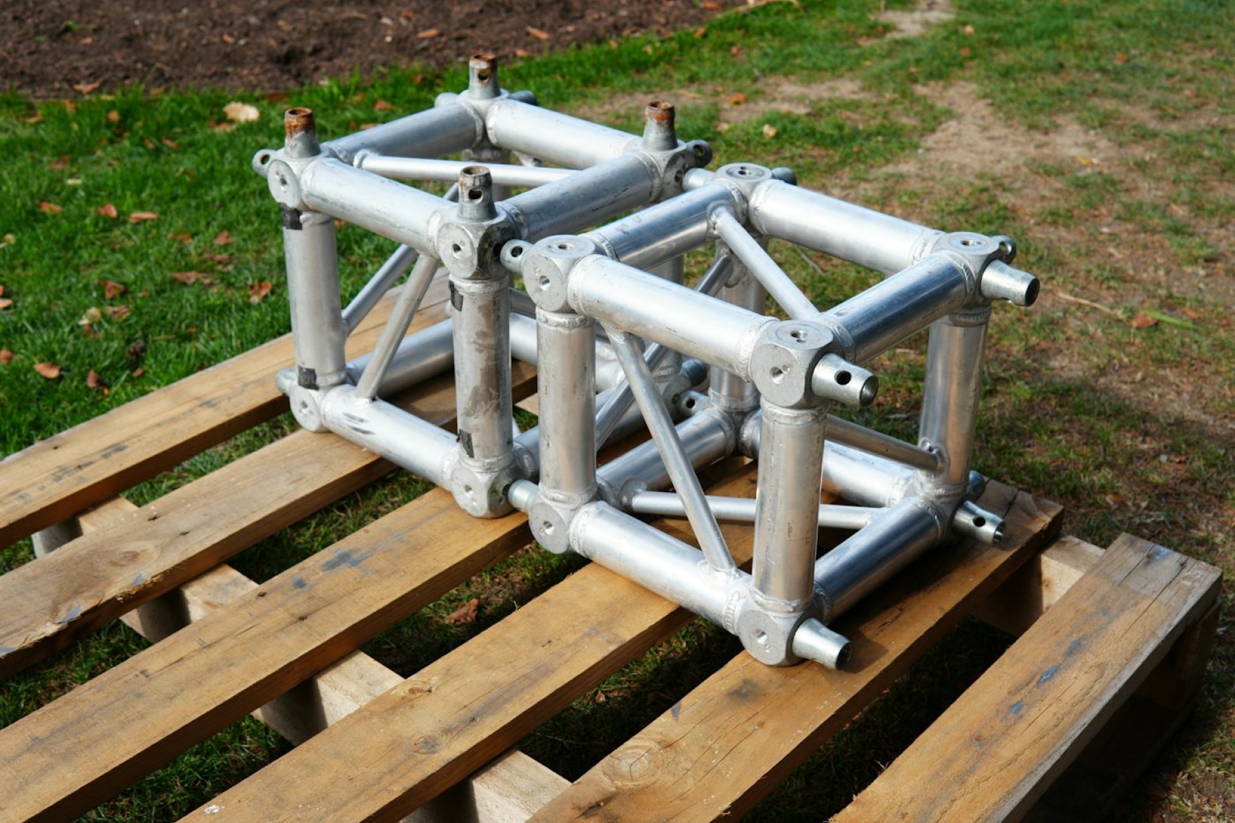 Aluminum truss sections staged for load-in